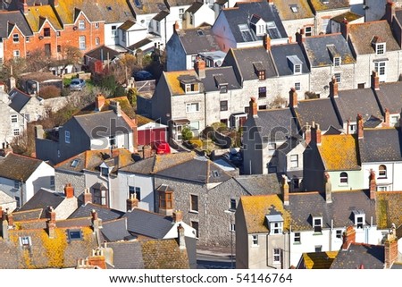 terraced English houses and narrow street in England