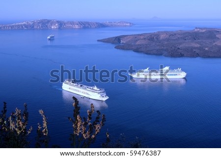Overview of blue Aegean ocean and volcanic island from Santorini, the most beautiful and romantic Greek island