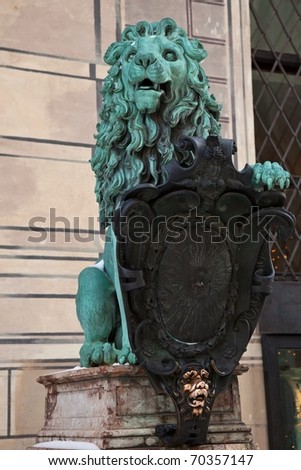 Bronze lion outside Residenz Palace in Munich Germany. Rubbed for luck