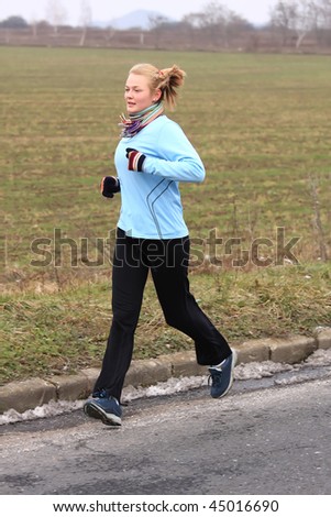 Young girl while training for a competition in winter