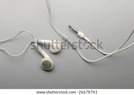 White earphone headphone