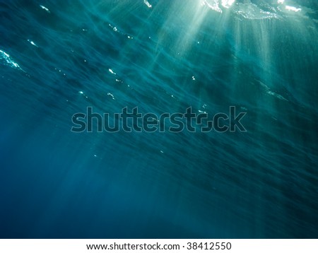 The underwater picture with the rays of light from the surface to depth