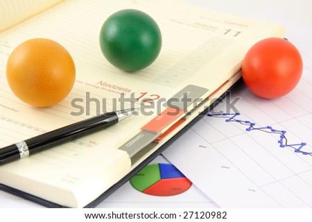 colored, eggs, and business calendar plus calculator, pen and chart