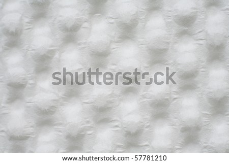 Repetitive circle structured white paper texture