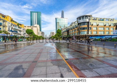 HO CHI MINH CITY, VIETNAM - Jul 20, 2015 : Nguyen Hue pedestrian street with Saigon Tax Trade Center, office buildings surround