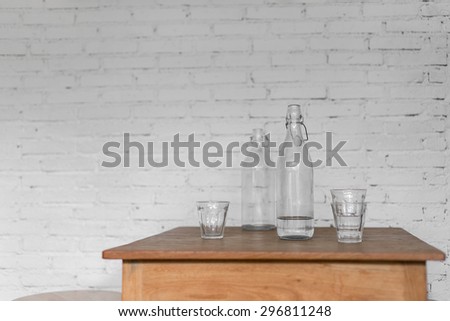 empty bottle on the wooden table