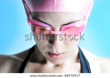 Woman swimmer with pink swim cap