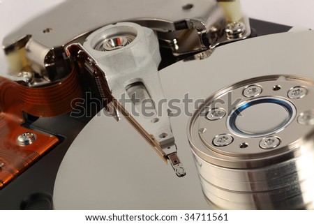opened winchester with hard disk drive and heads