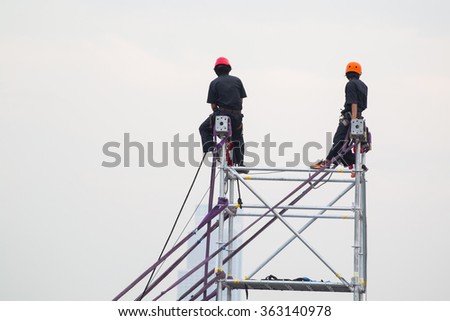 construction worker on a scaffold, symbolfoto for building, construction boom, labor protection