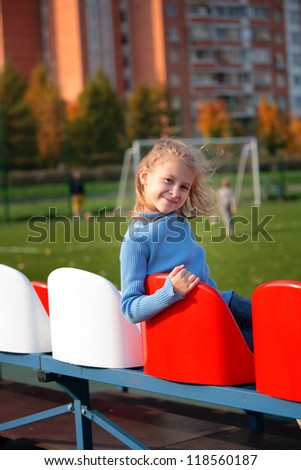 girl in football field