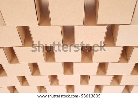 Cardboard boxes.Pyramid from boxes brown color