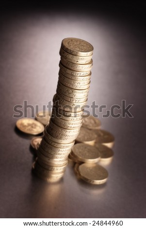 Pile of one pound british sterling coins