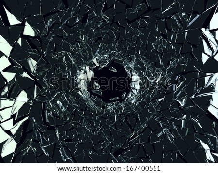 Shattered black glass: sharp Pieces and hole over black background
