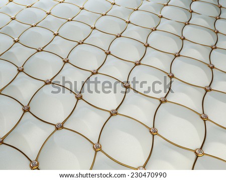 Luxury grey leather background with diamonds and golden wire. High resolution