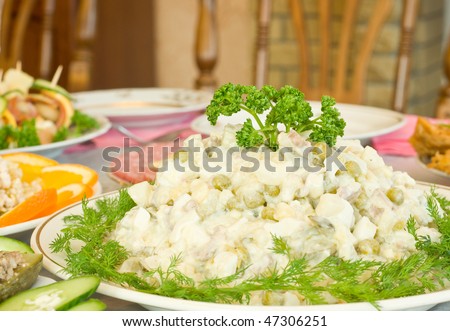 Tasty Russian salad. Banquet in the restaurant. Focused on one dish