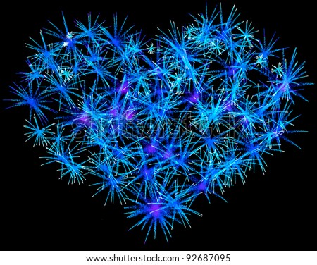Blue Fireworks heart shape for Valentines Day over black