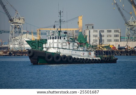 A tug boat enters the main channel at the Port of Los Angeles.