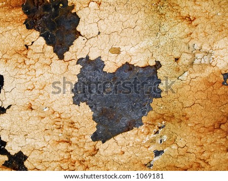 Stock macro photo of the texture of rusty metal with peeling paint.  Useful for grunge layer masks and abstract backgrounds.