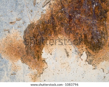 Stock macro photo of the texture of peeling painted metal.  Useful for layer masks or abstract backgrounds.