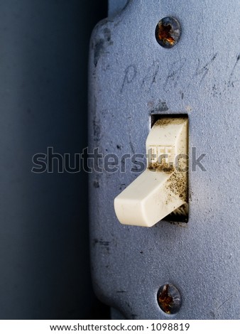 Stock macro photo of a light switch at a baseball field.