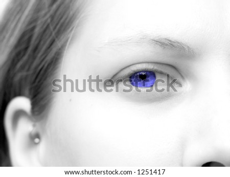 High-key, washed out, partial face, with false colored blue eye.