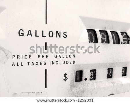 Up close view of an old gas pump.   Who buys 90 gallons of gas??   Maybe they filled up their tank on the ole SUV.