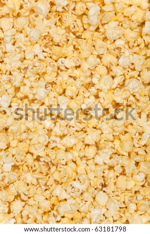 Closeup of yellow movie theater style popcorn background