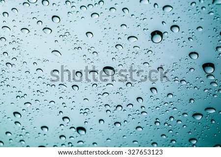 Drops of rain on a window glass.