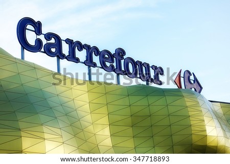 Rome, Italy - July,2014 - French international hypermarket chain Carrefour store logo in Rome, Italy
