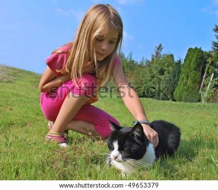 Child girl with cat