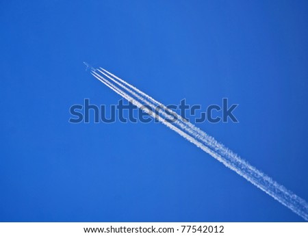 Airplane in a Blue Sky with Vapor Trail, Air Traffic, Jet Trail