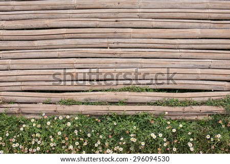 bamboo fence background with flowers