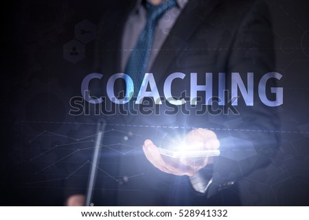 Businessman Use Smartphone And Selecting  Coaching, Touch Screen. Virtual Icon. Graphs Interface. Business concept. Internet concept. Digital Interfaces