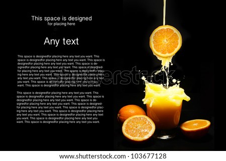 Orange juice splash on black background