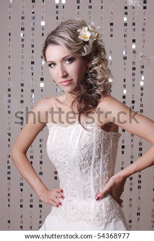 stock photo : beautiful bride with wedding hairstyle and flowers