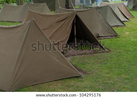 small military tents in a row