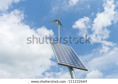 double power supply for an outside measuring instrument by a small solar panel and wind generator