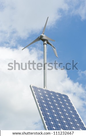 double power supply for an outside measuring instrument by a small solar panel and wind generator