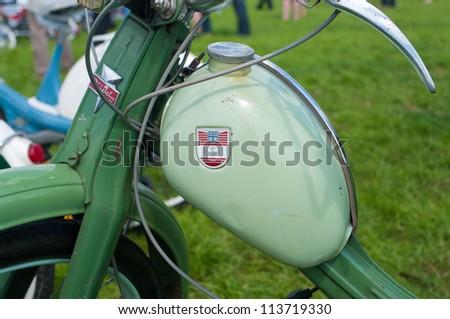 TWENTERAND, NETHERLANDS - JUNE 30: Gasoline tank of a NSU moped during an annual meeting of vintage motorcycles on June 30, 2012 in Twenterand, Netherlands