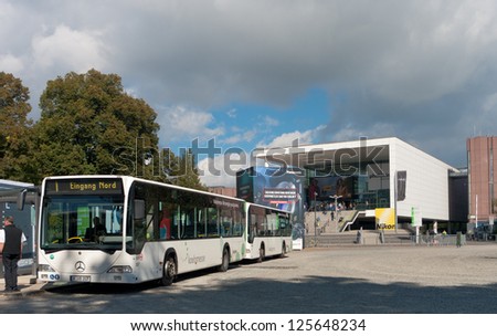 COLOGNE - SEPT 22: shuttle buses at Photokina on sept 22, 2012 in Cologne.  It is the world\'s leading imaging fair and brings together the industry, trade and consumers with a passion for photography