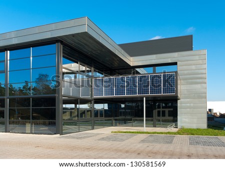 Oldenzaal, Netherlands - Dec12: Office With Solar Panels On December 12, 2011 In Oldenzaal, Netherlands. In 2013 Government Subsidizes 4 Billion Euros For Companies Who Invest In Sustainable Energy