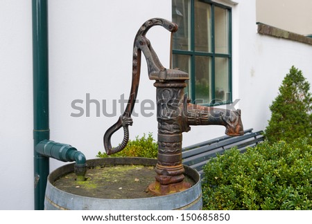 vintage hand water pump in Oudewater, Netherlands