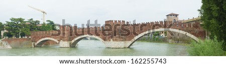 panorama of medieval stone bridge of Scaliger in Verona, Italy. The segmental arch bridge featured the world\'s largest span at the time of its construction.