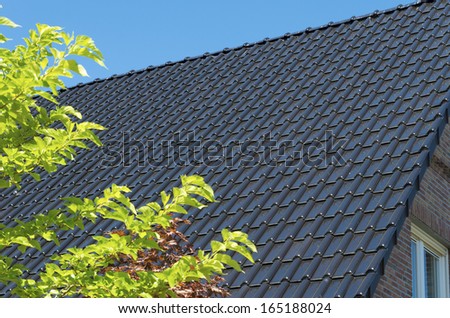 brand new roof top with dark tiles