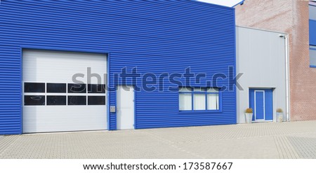 facade of a modern blue warehouse