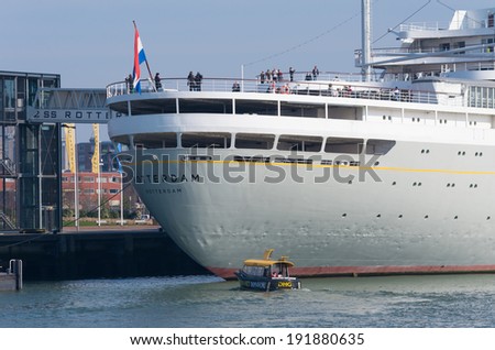 ROTTERDAM - MARCH 8, 2014: The 228 meter SS Rotterdam, former flagship of the Holland-America line. Out of service since 2008, it features a restaurant, theater, meeting rooms, and a hotel.