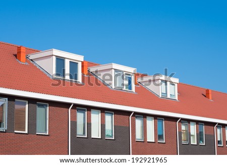 newly build terraced houses with dormer windows