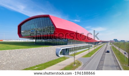 UTRECHT, NETHERLANDS - MARCH 29, 2014: The wall, a red shopping mall and noise barrier along the A2 highway. With 800 meter this is also the longest building in the netherlands.