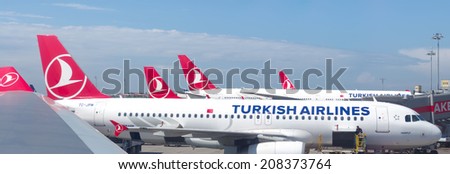 ISTANBUL - MAY 2, 2014: Turkish airlines planes on the Ataturk international airport In 2014, Turkish Airlines has been chosen for the fourth time in a row as the best airline in Europe