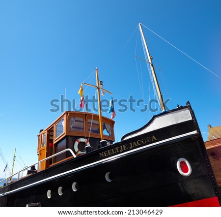 URK, NETHERLANDS - MAY 31, 2014: Fishing boat in dry dock. Urk has by far the largest fishing fleet and fish processing industry in the Netherlands.